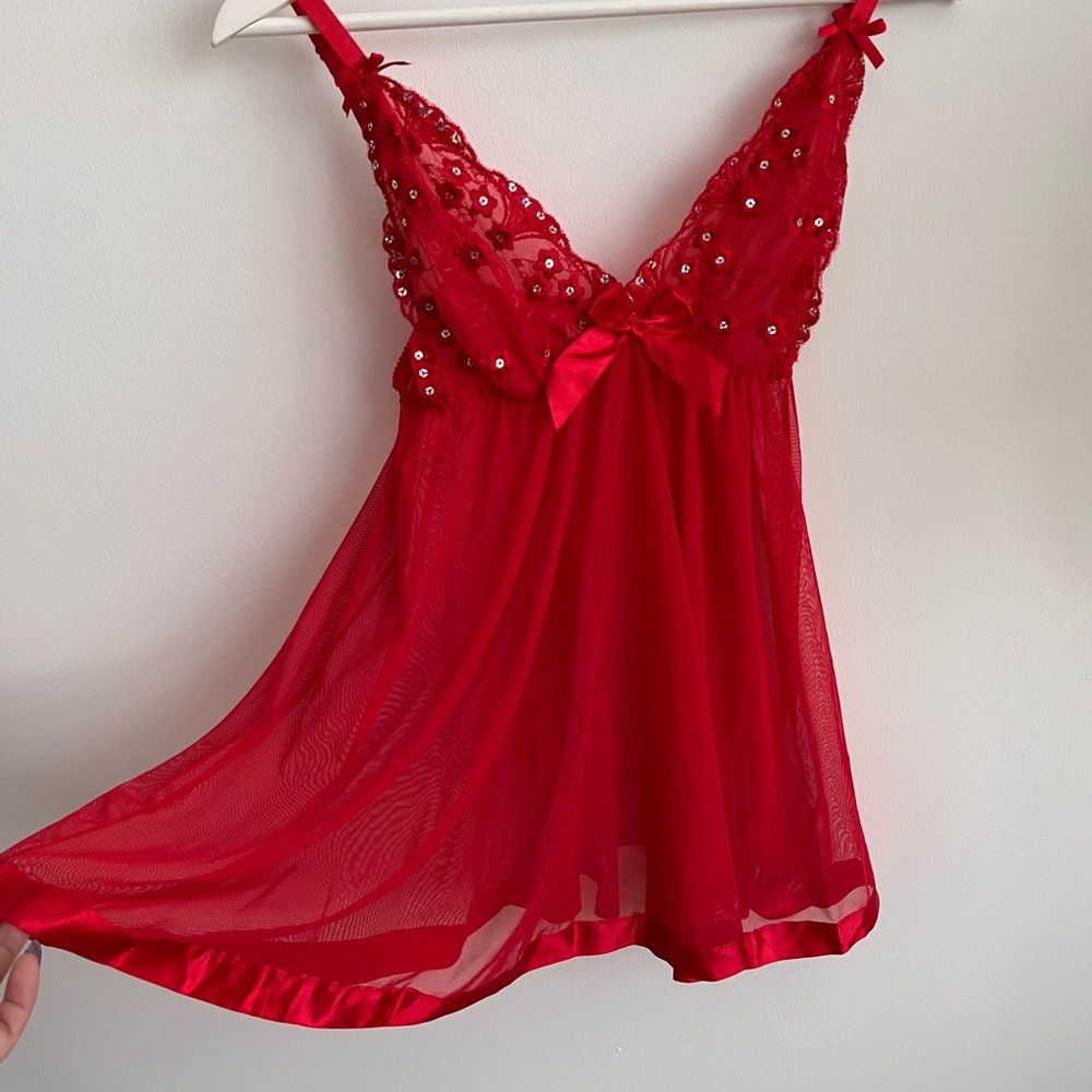 Red mesh babydoll dress with sequin details